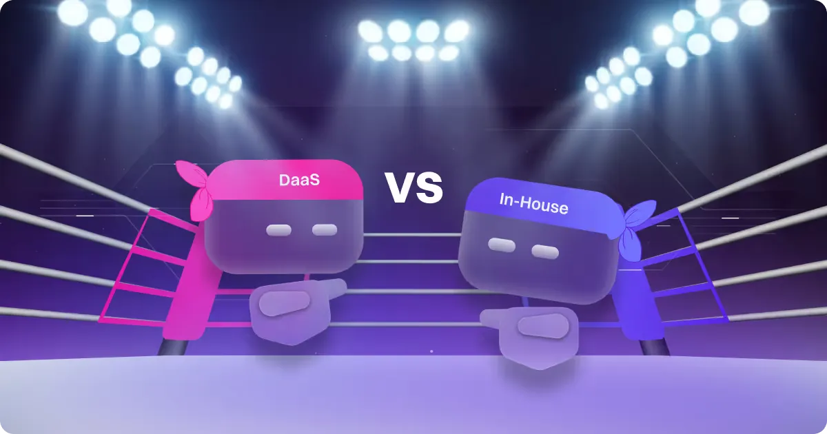 A graphic depicting a boxing ring showdown between two characters representing "DaaS" (Data as a Service) in pink and "In-House" in blue. The background features spotlights and a dark purple gradient, reinforcing the competitive theme. The characters have cute designs, wearing bandanas and showing playful boxing stances.